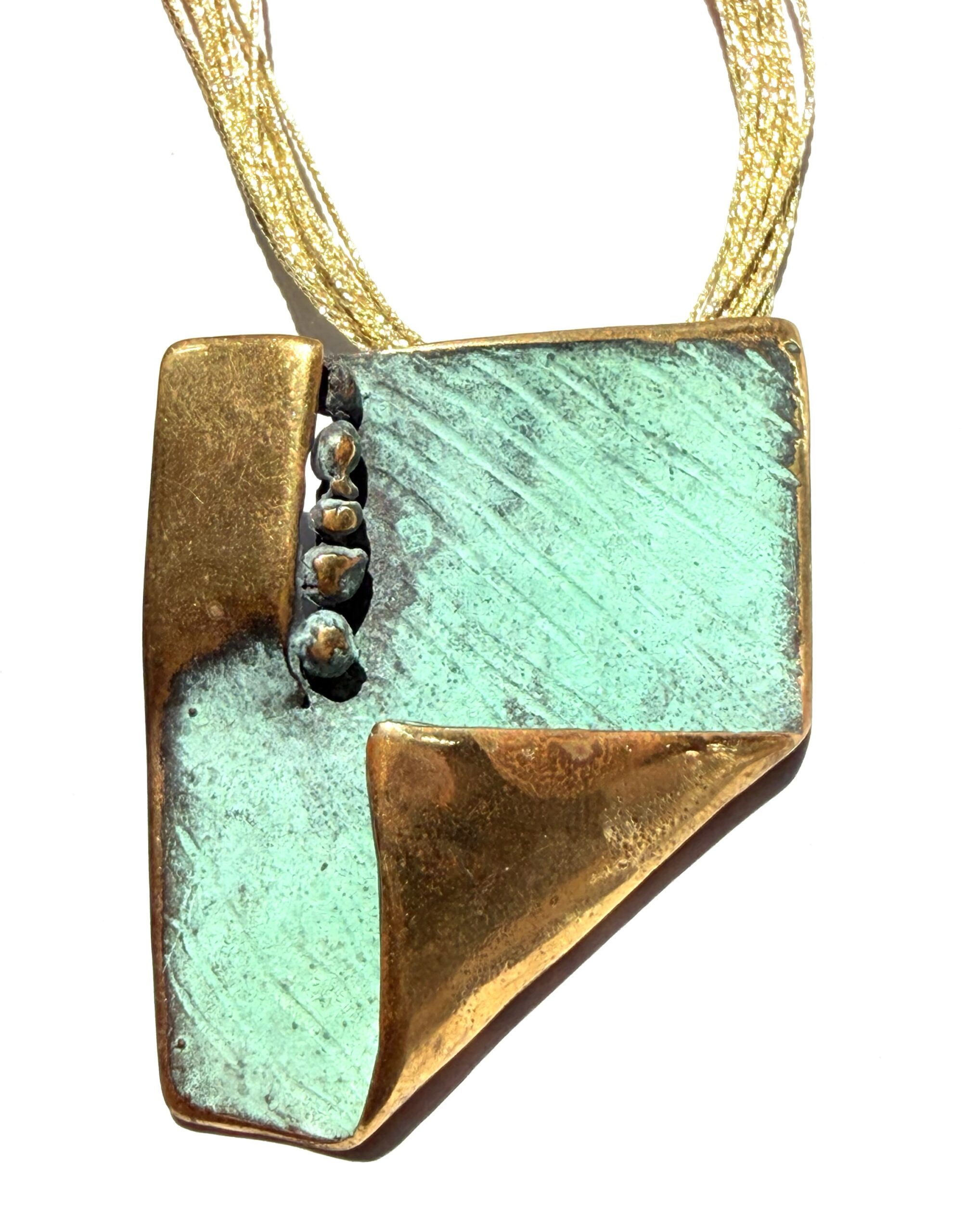 Colgante de bronce