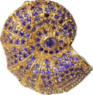 Sortija chapado en oro con circonites azules.